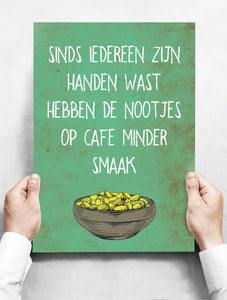 Wandbord: Sinds iedereen zijn handen wast hebben de nootjes op cafe minder smaak! | 30 x 42 cm